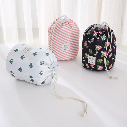 Redesign waterproof makeup bag with zip closure, durable fabric, and compact design for organizing cosmetics and toiletries.