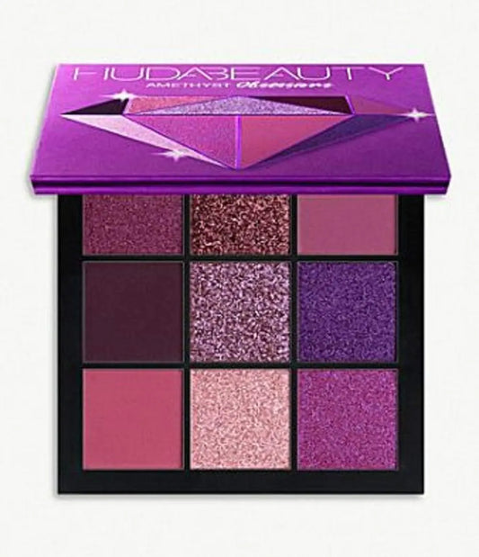 Redesign Obsessions Eyeshadow Palette with vibrant shades in a compact, versatile makeup palette featuring neutral and bold colors.